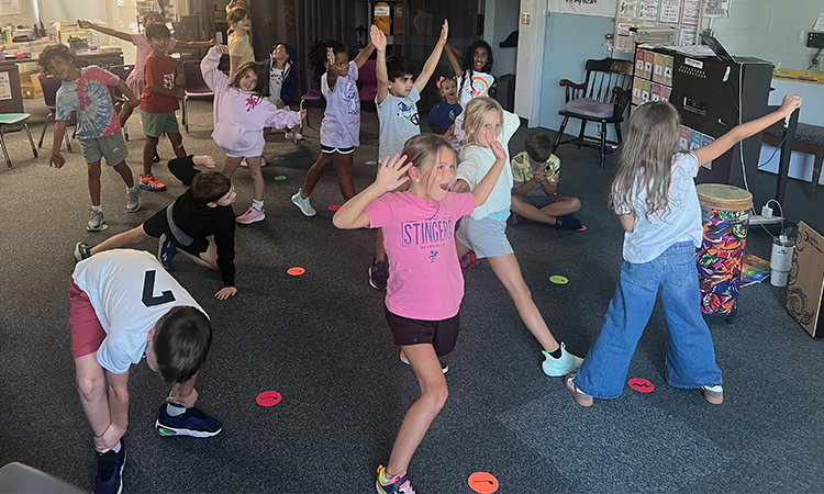 Second-graders-dance-in-music-class Second graders dance during music class.