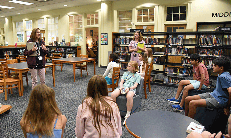 Sixth-graders-learn-about-the-Middle-and-Upper-School-library-during-Library-Orientation-Week Sixth grade students learn more about the library during Library Orientation Week